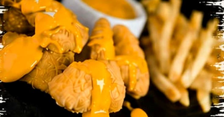 Nuggets melt bañados en cheddar
